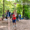 Tour Coopérative en bois avec cordes et blocs empilés